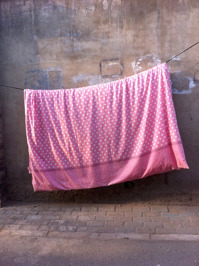 Drying laundry in a hutong